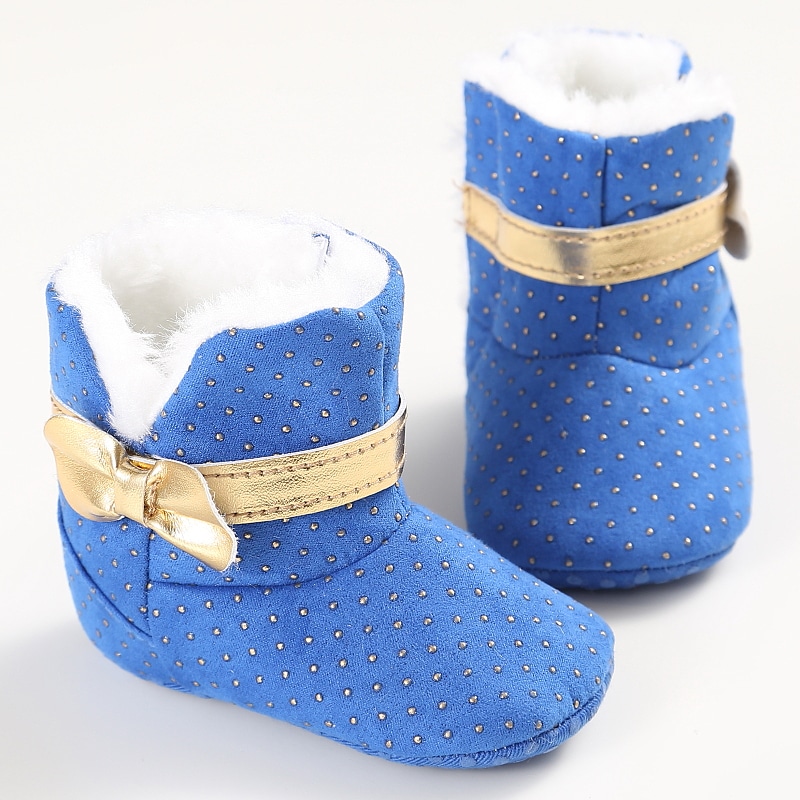 gold branded baby shoes